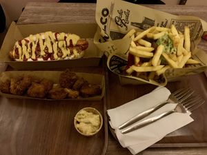 No pig dog, vegan fried chicken and black mamba loaded fries    at Friterie Chasse Patat in Ghent
