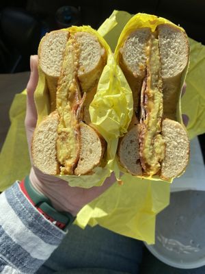 Bacon, egg, and cheese on onion bagel  at Ben & Esther's Vegan Jewish Deli in Portland