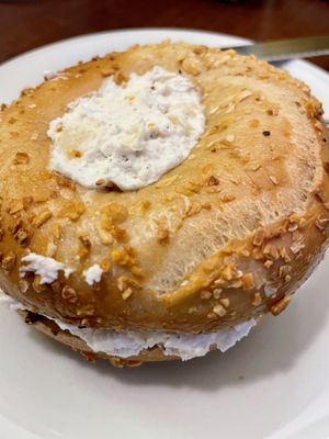 Pear cardamom schmear on onion bagel   at Ben & Esther's Vegan Jewish Deli in Portland
