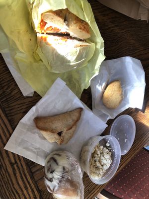 Lox, potato knish, hamentashen,cinnamon roll, and white fish salad  at Ben & Esther's Vegan Jewish Deli in Portland