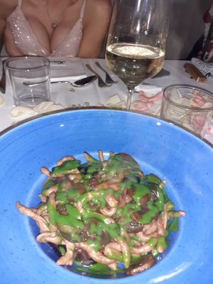 vegan strozzapreti con funghi, carote nere, and basil pesto for topping at La Campaza in Fosso Ghiaia