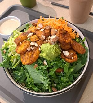 Vegan salad with tahini-orange dressing at RAW & BOWL'D in Amman