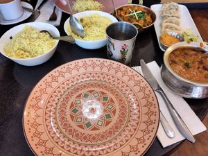 From left: Pulao rice, Brinjal aloo, Momos and Jalfrezi at Hullabaloo - Greenwich in South East London