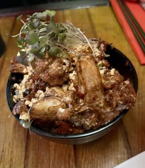 Sichuan fried cauliflower, Sichuan chilli oil, sesame, crushed peanuts  at Seven Lucky Gods in Bristol