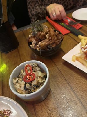 Charred hispi cabbage, 
coffee & Dijon dressing, sesame, chilli  at Seven Lucky Gods in Bristol