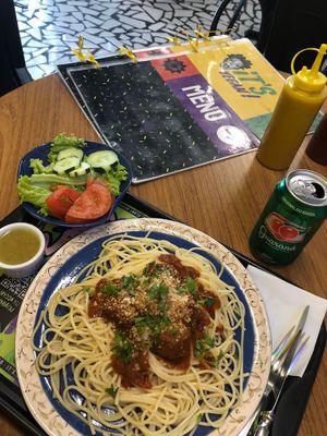 Plate of the day; home made tomato sauce with soya meatballs,spaghetti and dressed salad at It's Vegan in Sao Paulo