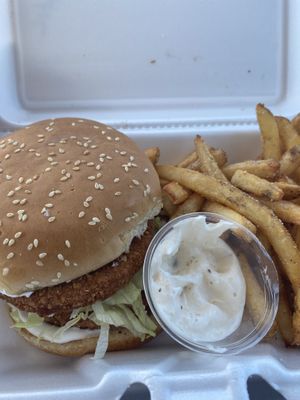 Crispy chicken sandwich with the amazing fries again  at Bougie Vegan in Belton