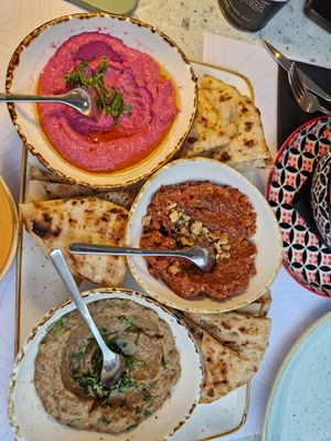 Dips to share with pita (Beetroot Hummus, Baba Ganoush and Muhammara) at Ousia Soulful Kitchen in Limassol