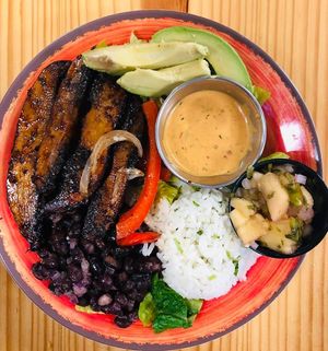 Vegan Fajita Buddha bowl with a Chipotle dairy free Ranch dressing, Avocado, pineapple jalapeno salsa, brown rice, romaine and grilled portabella mushrooms, red peppers and onions at Thyme for Lunch in San Antonio