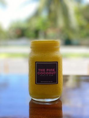Pineapple, mango, Ginger, turmeric, lime, black pepper at The Pink Coconut in Cancun