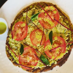 Vegan Chickpea Crust Raw Almond Cheese Pizza at The Pink Coconut in Cancun