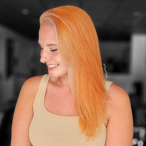 Orange overlay with platinum money piece at VeganColorist in Tampa
