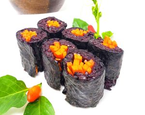 Pickled Carrot Roll - Pickled carrots rolled inside nori at Daikon Vegan Sushi in Las Vegas