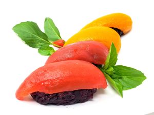 "Salmon" and "Tuna" nigiri - roasted seasoned bell pepper and tomato on rice at Daikon Vegan Sushi in Las Vegas