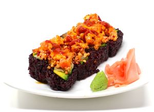 Volcano Roll - Baked California roll with spicy "Tuna" on top. Touch of sweet soy, pineapple sauce, and chili sauce. at Daikon Vegan Sushi in Las Vegas