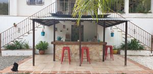 Bar and outside kitchen at Finca Pereila in Coin