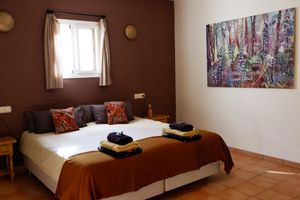 Room ' Tierra' with big double bed at Finca Pereila in Coin