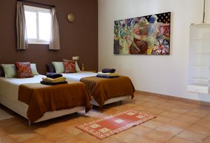 Room 'Tierra' with 2 single beds at Finca Pereila in Coin