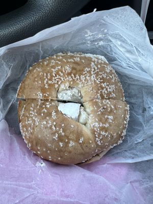 Toasted salt bagel with vegan cream cheesee  at Cella Bagel in Selden