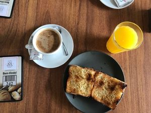 Vegan Breakfast - capuccino, orange juice and brioche toast at Padaria Massa Madre in Sao Paulo