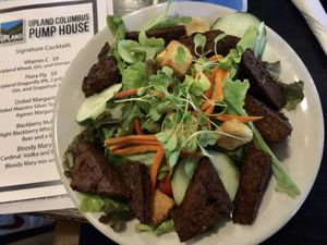 The Upland salad with housemade southwest tofu! Very tasty tofu! 😊 Ask for it to be veganized so that they give you the vegan croutons. at Upland Brewing Co. Columbus Pump House in Columbus