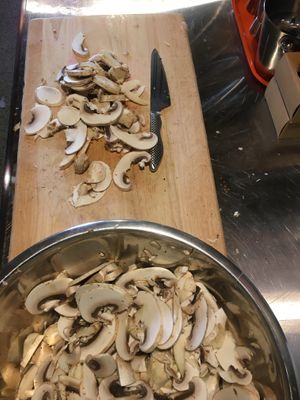 Preparando hongos  at Poncho Tacos in Athens