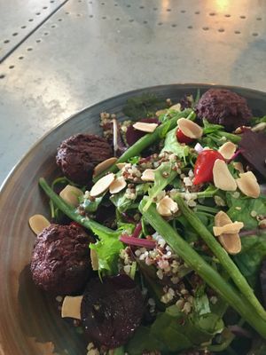 Beetroot falafel salad with toasted almonds! So delicious, best salad I’ve eaten out. Only a couple of vegan options on the menu but they’re great choices   at Harbour Lights in Paignton