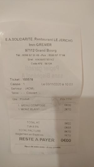 My bill for a lunch including a plate of various hot vegetables with soy steak and a lovely coconut cake called "Mont-blanc".  at Le Jericho in Grand-bourg