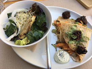 Summer salad and gluten free hummus and tempeh crepes. Wow. at Aguaribay in Barcelona