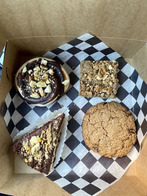 Wednesday treat box!! Oatmeal cookie, banana nutella roll, PB&J bar, and chocolate chip cookie CAKE!! at Cats Luck Vegan in Neptune City