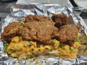 CLFC bowl—housemade fried chicken, mashed potatoes and gravy, mac and cheese, corn, and cheddar  at Cats Luck Vegan in Neptune City