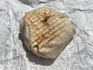 A perfectly wrapped craunchwrap  at Cats Luck Vegan in Neptune City