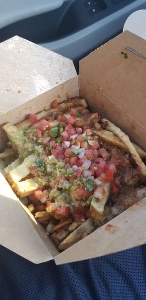 Loaded fries with mushroom beef! at Flavors in Phoenix