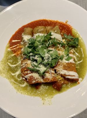 Enchiladas with both red and green sauce at GuacStar Kitchen and Cantina in Tempe