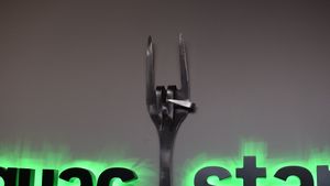 Arizona State University fork devil's sign at GuacStar Kitchen and Cantina in Tempe