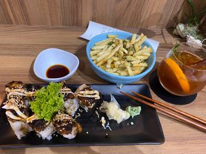 Sushi is great! Can skip the fries(not hot) and drink is pricey.  at Lucky Cat Cafe in Northeast Singapore