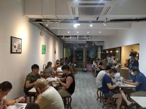 restaurant interior. Full house at Lucky Cat Cafe in Northeast Singapore