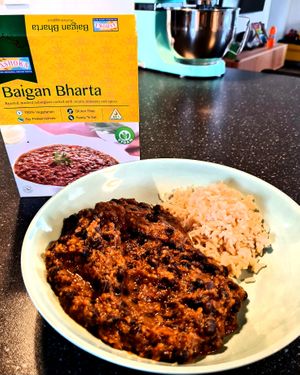 Baigan Bharta served with brown rice.  at JedzHneď in Bratislava