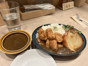 Western style curry with soy meat, roasted onion and white rice (and extra curry sauce)  at RUCY+R 横浜ジョイナス店 in Yokohama