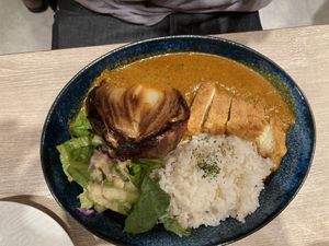 Spicy curry with tofu cutlet and fried onion toppings  at RUCY+R 横浜ジョイナス店 in Yokohama