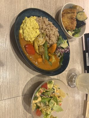 Tomato curry set with omelette and added katsu, eggplant  at RUCY+R 横浜ジョイナス店 in Yokohama