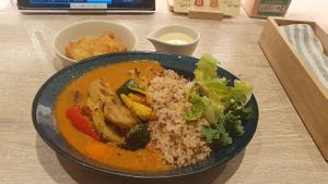 Soft tomato curry with vegan cheese and tofu katsu at RUCY+R 横浜ジョイナス店 in Yokohama