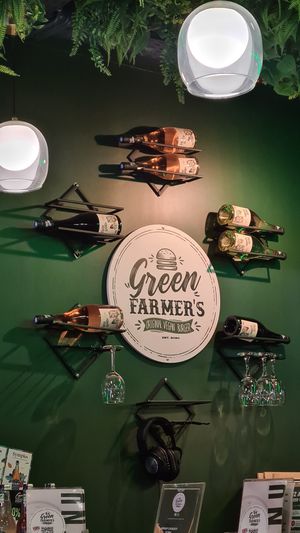 Logo sign on the wall at Green Farmer's in Paris