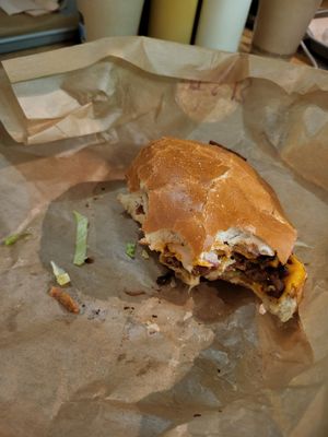 Half of my triple....burger.... at Green Farmer's in Paris