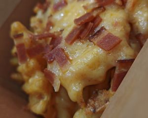 Crispy potato wafers with Smoked vegan bacon and vegan cheese at Green Farmer's in Paris