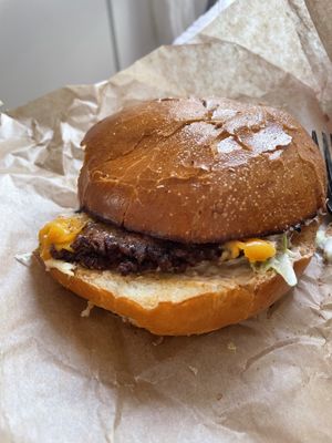 The Green Smash Burger impressed me with the beautiful combination of caramelized onions, perfectly melted cheese and a crisp smashed patty.   at Green Farmer's in Paris