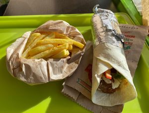 I ended up getting a small falafel wrap with all the salad they had, tahini, hummus and chilli sauce and a side of cheese. The falafel was soft and the veg was extremely fresh! at Falafel Coše in Belgrade