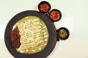 Green Enchiladas filled with "chicken" made from Bamboo fiber at Verde Y Rojo in Tijuana