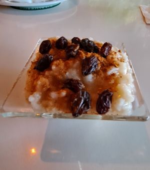 Rice Pudding (Almond milk) with cinnamon and raisin.😋 at Verde Y Rojo in Tijuana