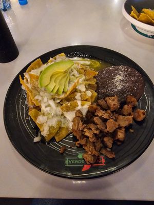 Chilaquiles verdes with "asada" option at Verde Y Rojo in Tijuana